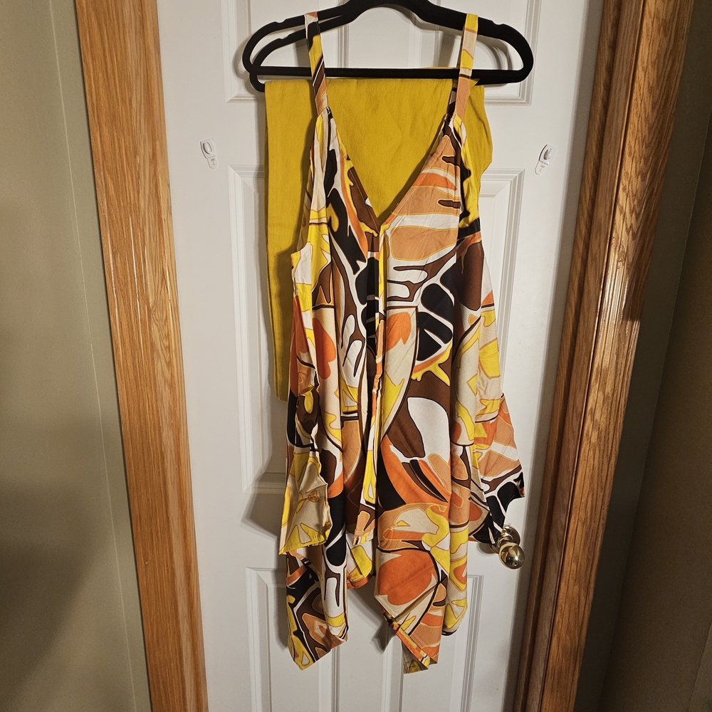 Vibrant Multicolor Sleeveless Dress and Mustard Yellow Jeans